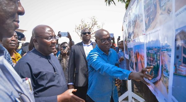 Vice-President Mahamudu Bawumia (3rd right) being briefed on the project designs by officials of the Department of Urban Roads. With them are the Minister of Roads and Transport, Mr Kwasi Amoako-Atta (4thright) and Mr Titus-Glover (2nd right), the MP for Tema East.